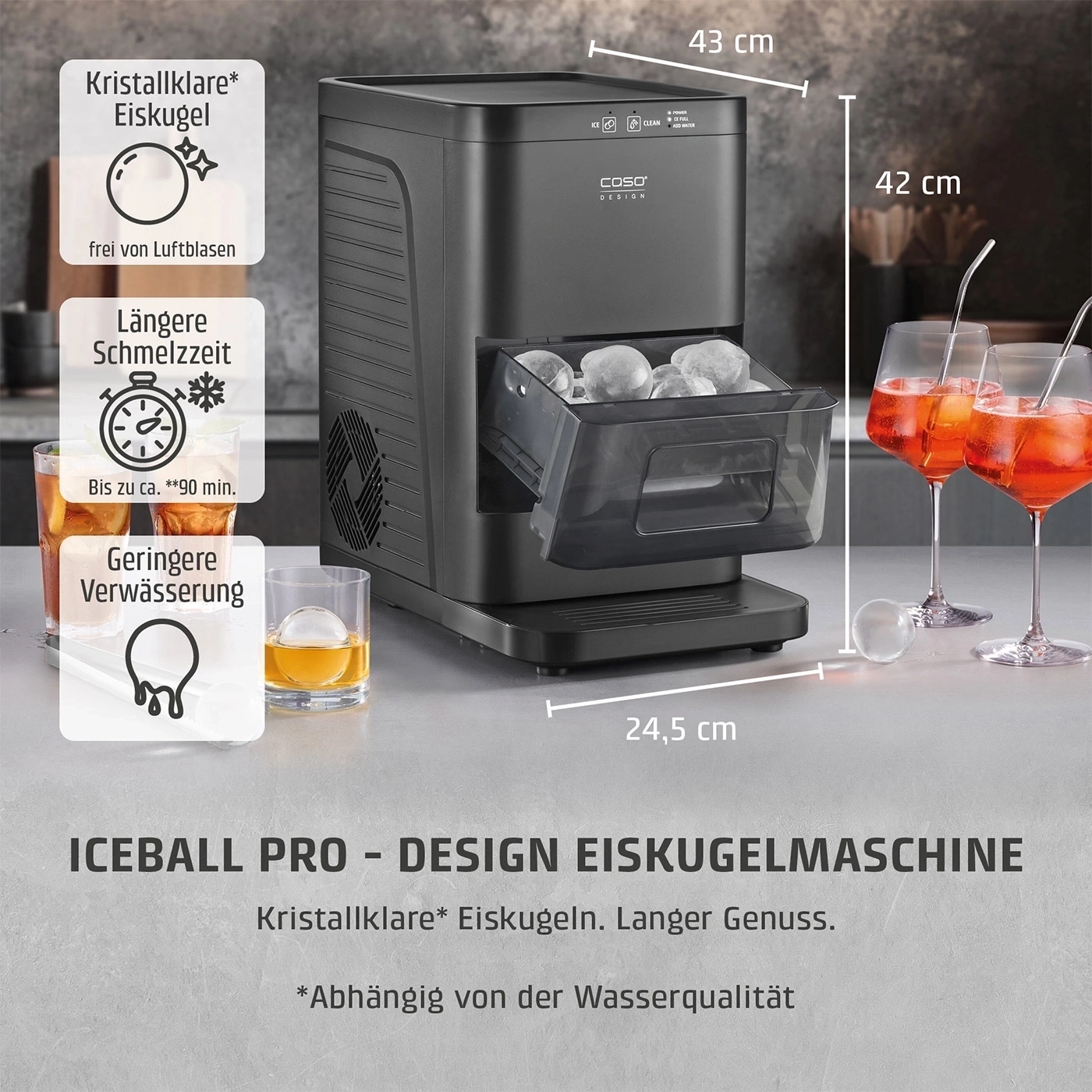 Eiswürfelmaschine mit großen, klaren Eisbällen und Maßangaben.