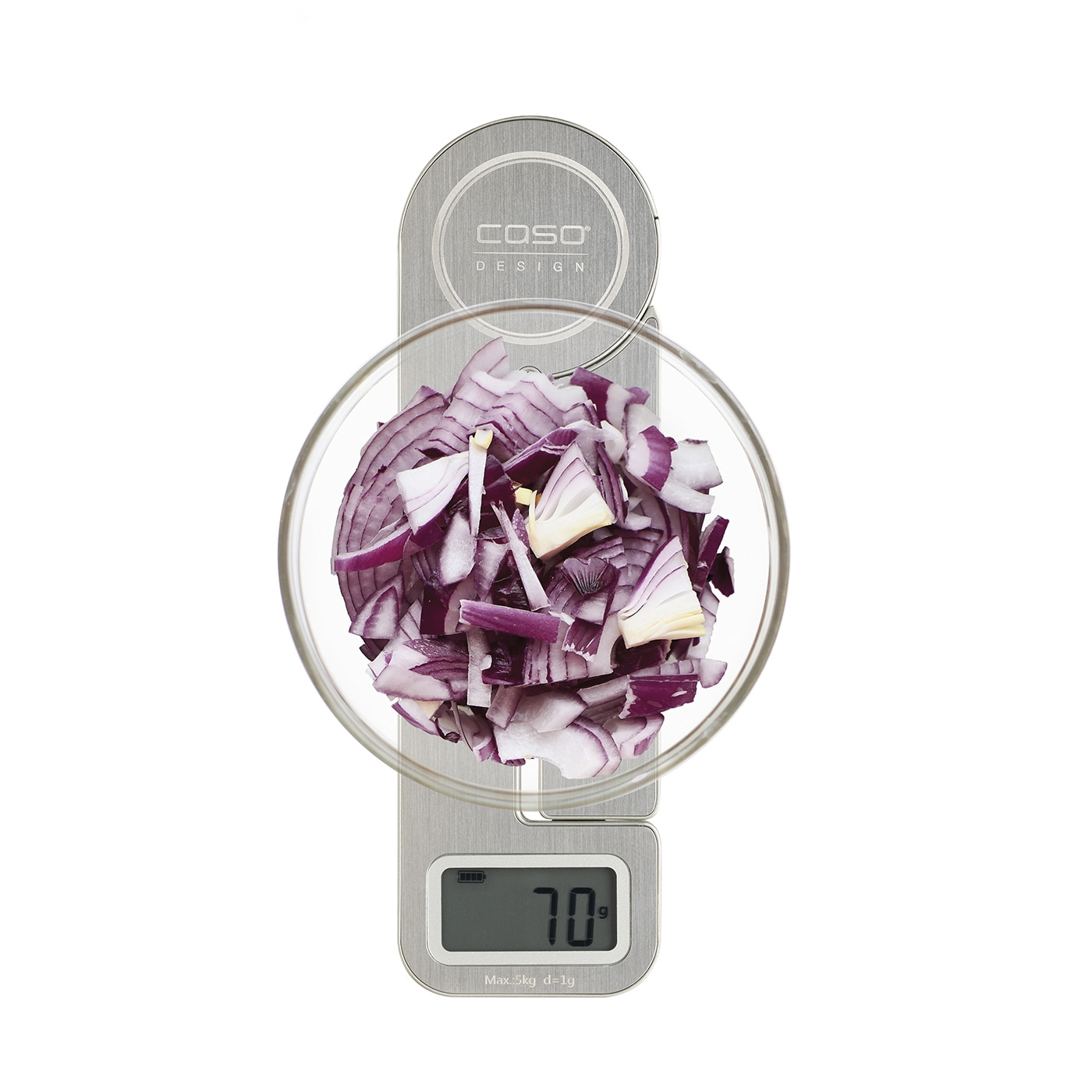 Red onions on a scale, displaying 70 grams, in a glass bowl on a white background.
