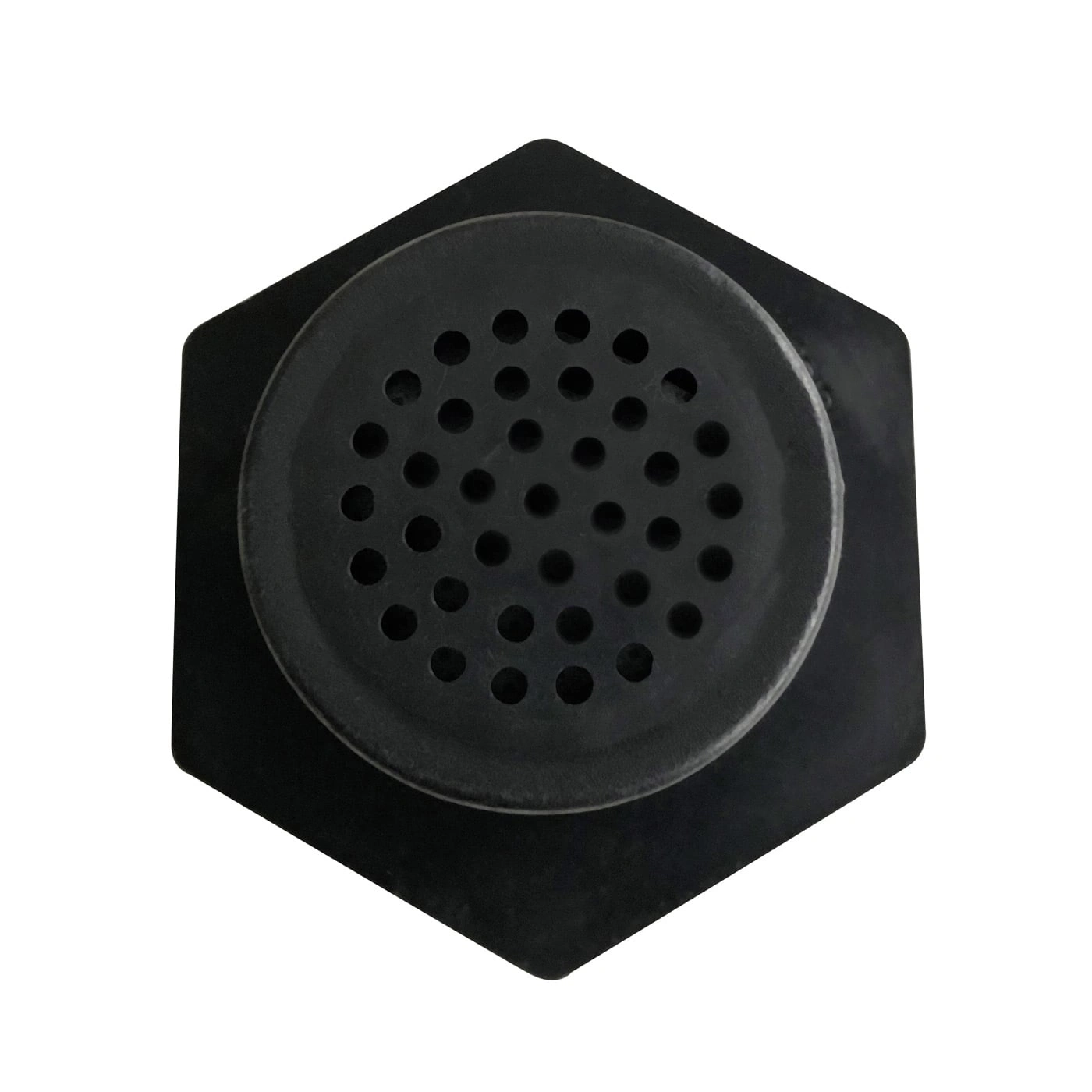 Haut-parleur hexagonal noir avec un couvercle rond perforé.
