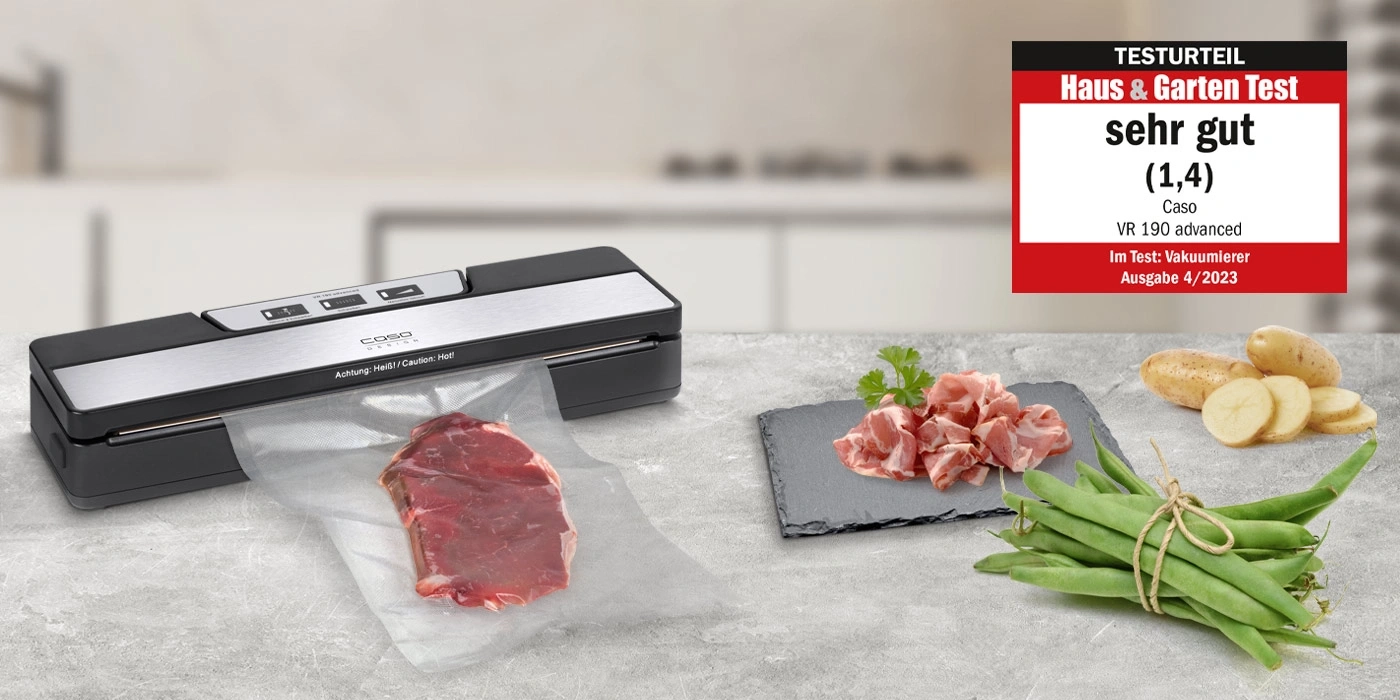 Vakuumierer mit Fleisch, Schinken, Bohnen und Kartoffeln