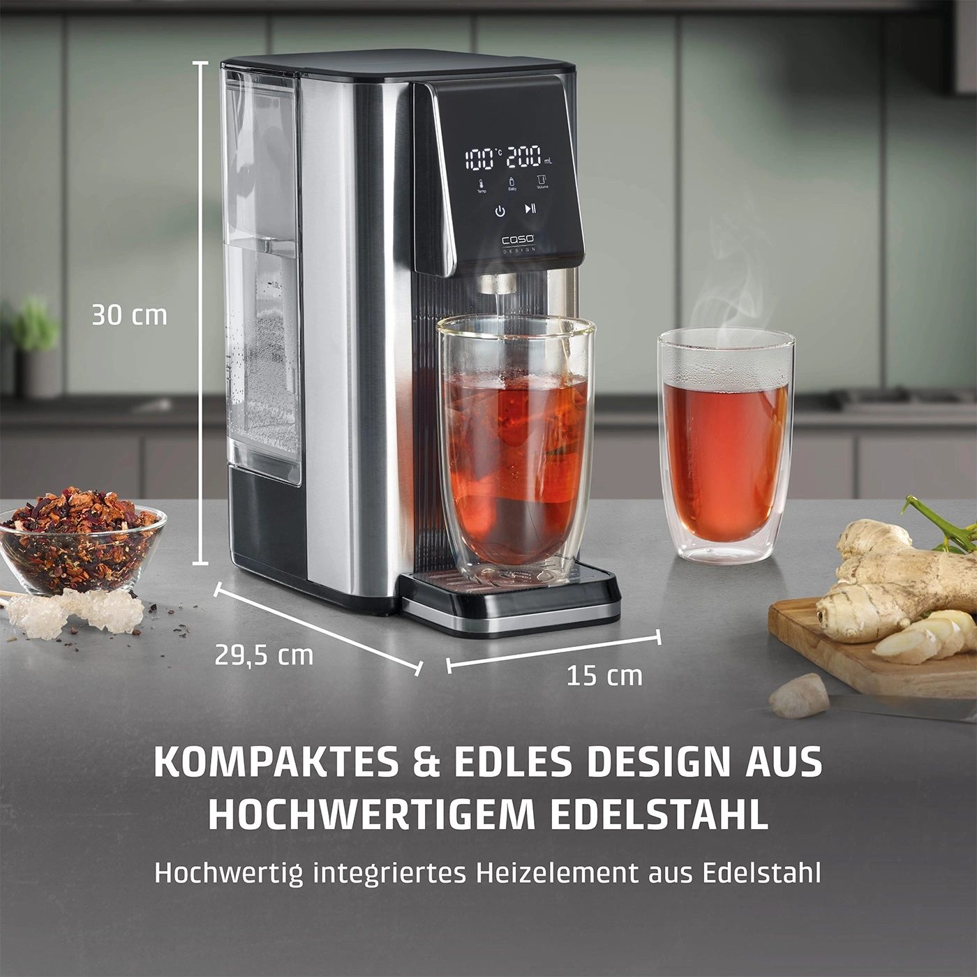 Distributeur d'eau compact en acier inoxydable avec deux verres de thé et du gingembre.