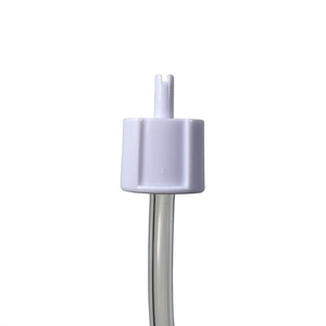 White plastic cap with tube, close-up, isolated on white background