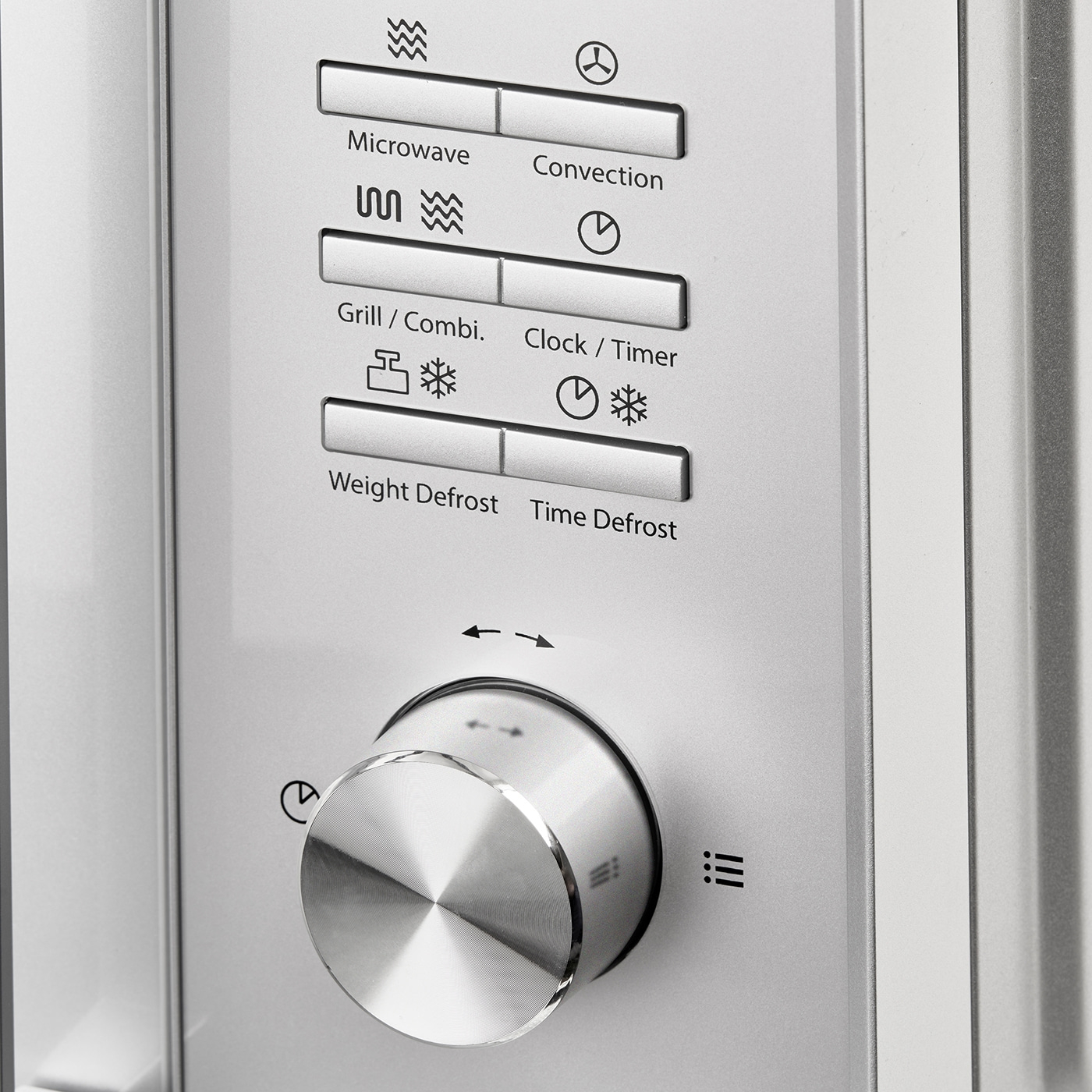 Microwave control panel with knob for functions like microwave, grill, and defrost.