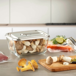 Mushrooms, salmon, lime, dill, cutting board, kitchen, food, glass container, stainless steel