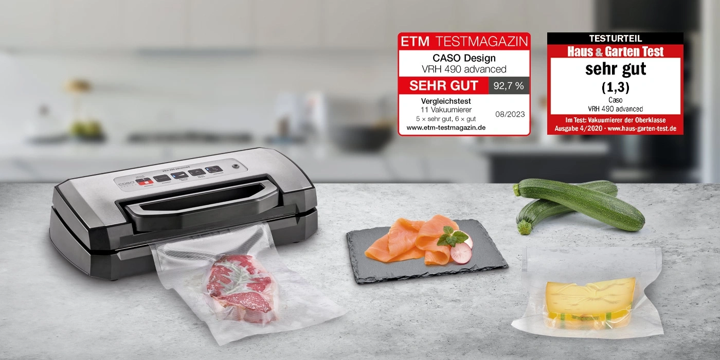 Vakuumiergerät mit Fleisch, Lachs und Käse, Siegel und Testurteil.