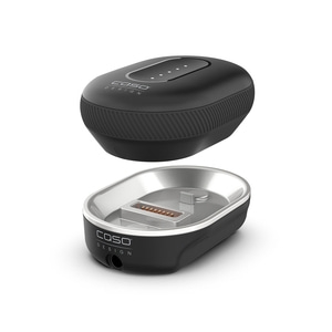 Chargeur noir avec intérieur argenté et logo Caso Design, séparé.