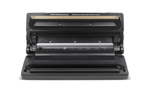 Opened black Caso VC350 vacuum sealer with control panel and warning labels, ready to use.