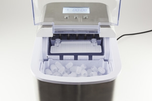 Ice maker with ice cubes, stainless steel, digital display, and control buttons