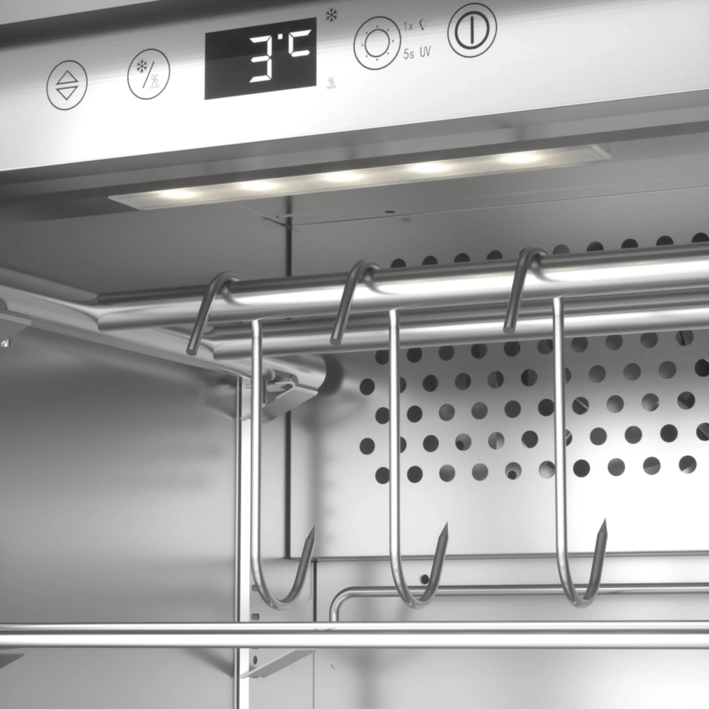 Intérieur de réfrigérateur avec crochets, affichage de la température et éclairage. Design en acier inoxydable.