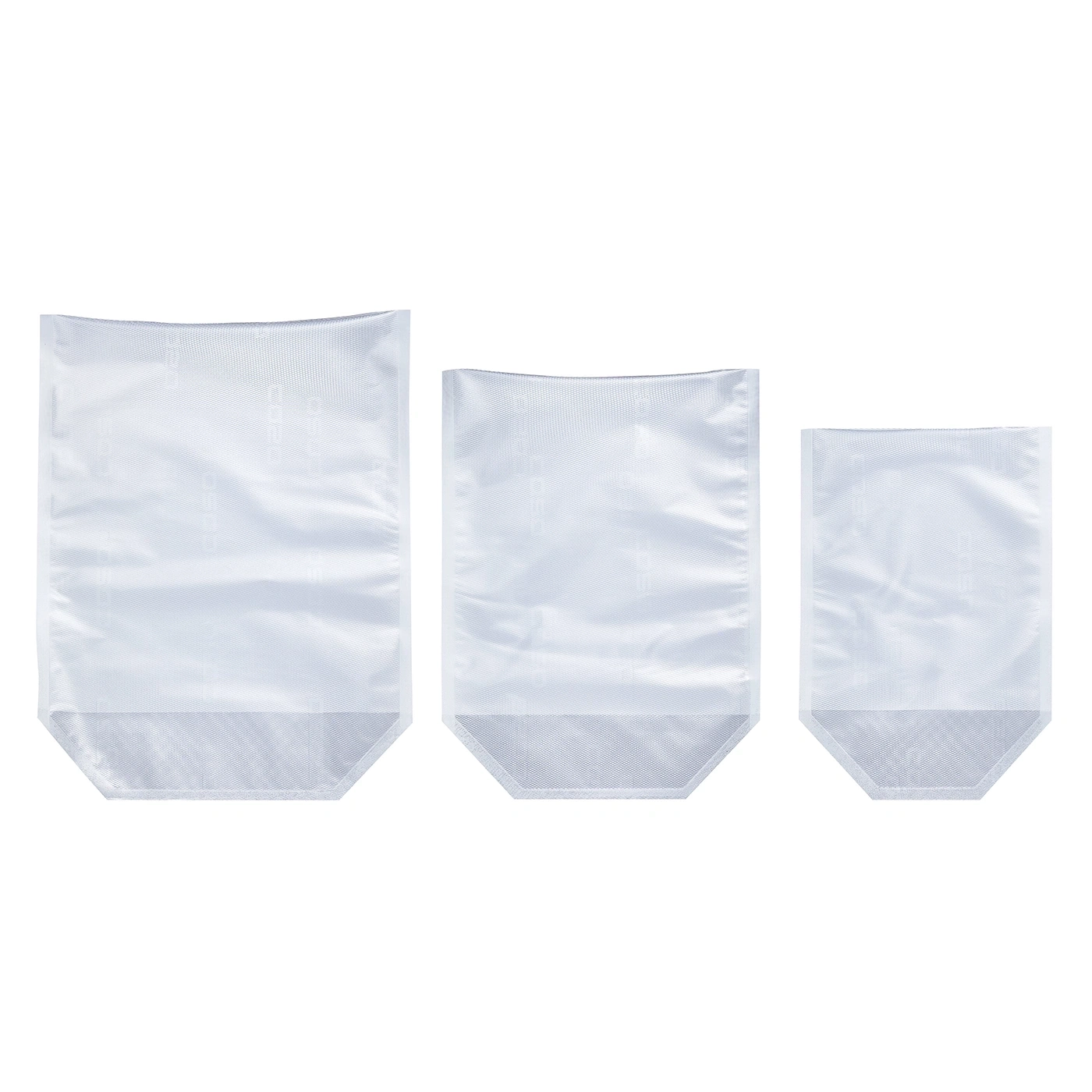 Three white bags of different sizes side by side